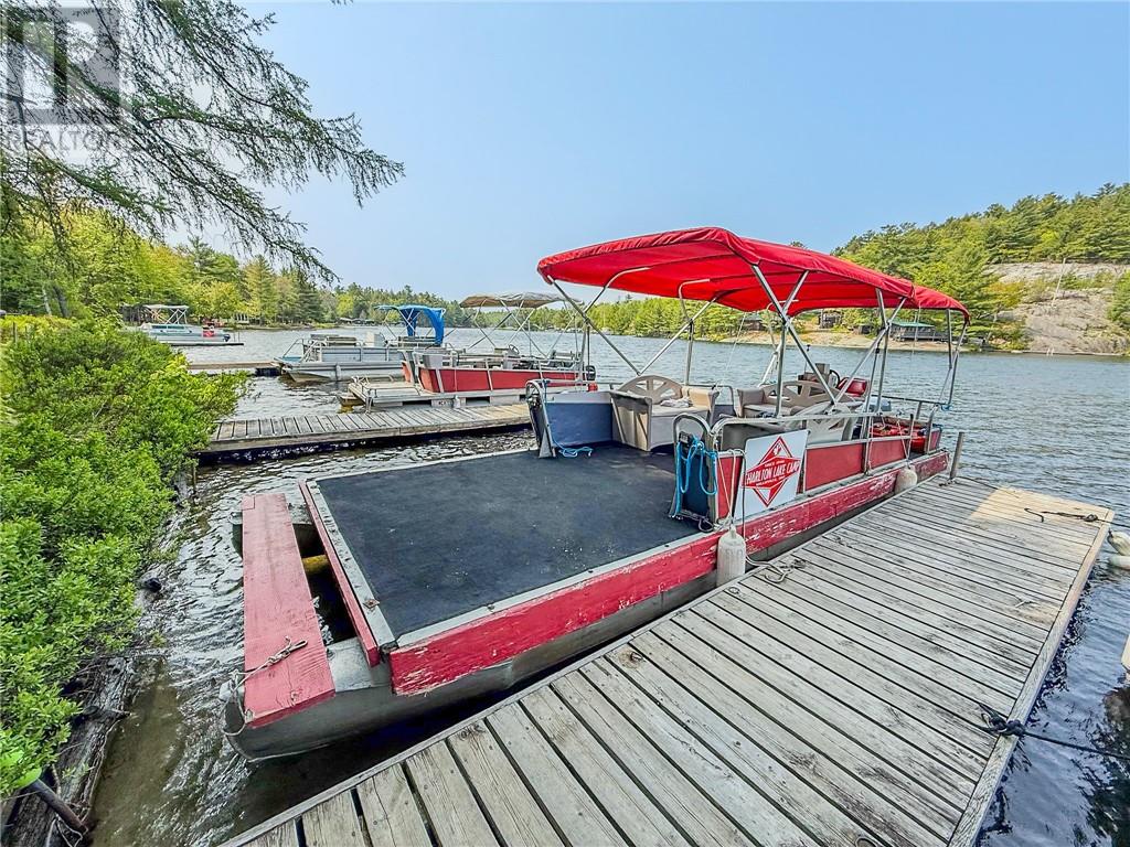 Boats and docks used for Charlton Lake Camp water access